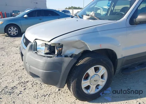 2003 Ford Escape Xlt z USA, uszkodzony, nr VIN 1FMYU93183KB81224